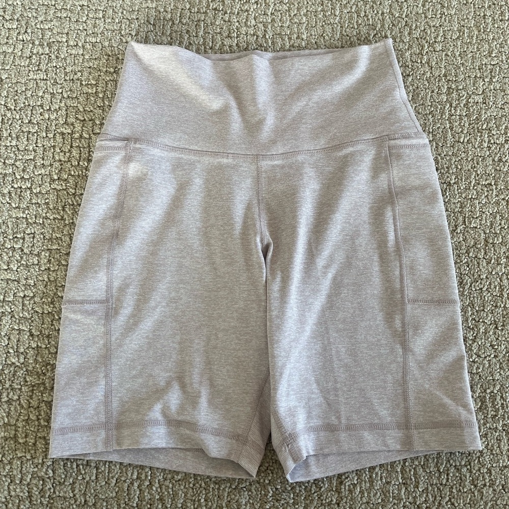 Vuori light pink biker shorts size small